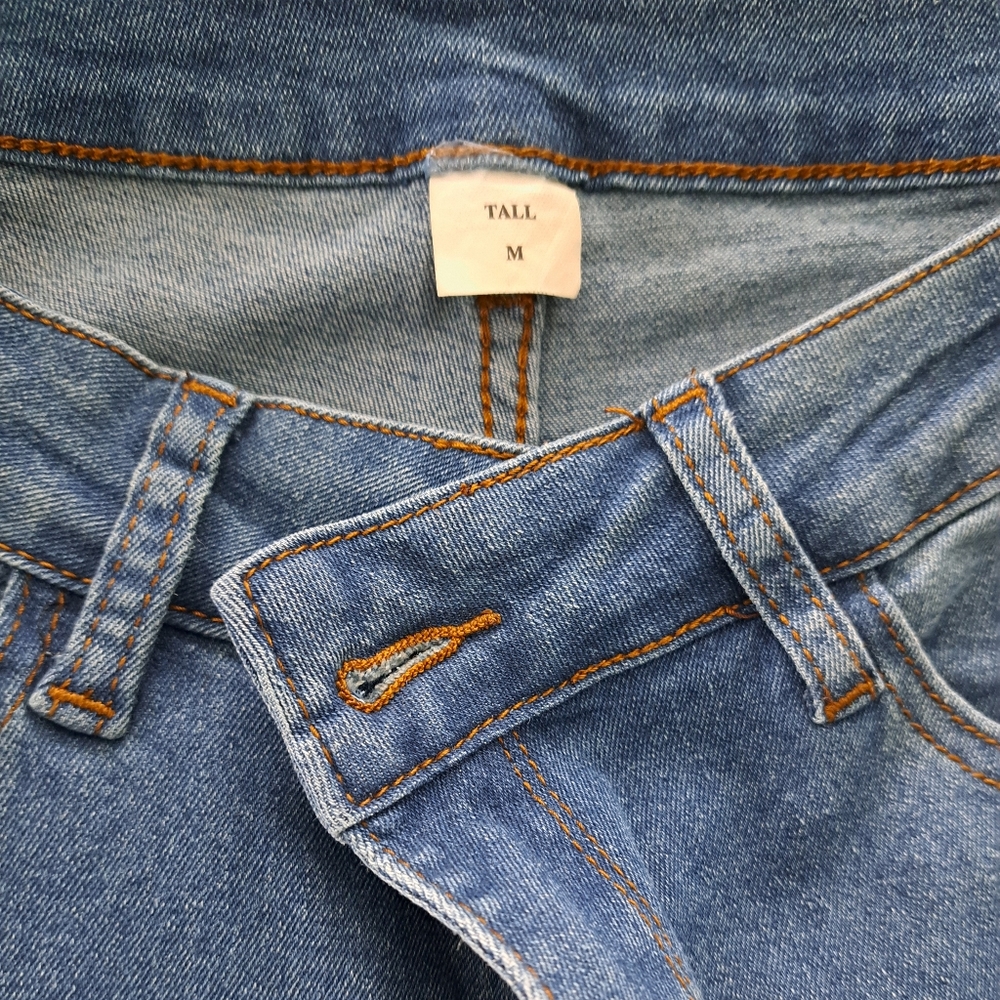Jeans.  Stretch all over!  Raw bottom...